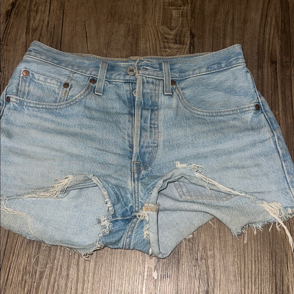 Levi’s 501 Light Blue Distressed Denim Shorts